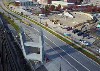 Work on U-District pedestrian bridge stops for season